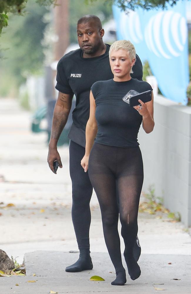 June 14, 2023: In what was Censori’s first public appearance wearing tights with no pants, the celeb couple ditch their shoes for this outing to pick up some KFC for lunch. Picture: SPOT-Stoianov / BACKGRID