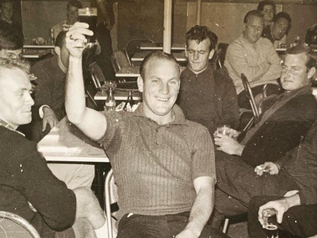 BUCK’S NIGHT: John shares a drink with his mates on the eve of his wedding at the famous “The Patch” beer garden in Coolangatta.