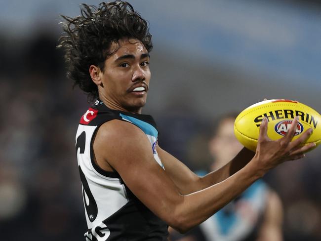 GEELONG, AUSTRALIA - AUGUST 05: Jase Burgoyne of the Power marks the ball during the round 21 AFL match between Geelong Cats and Port Adelaide Power at GMHBA Stadium, on August 05, 2023, in Geelong, Australia. (Photo by Darrian Traynor/AFL Photos/via Getty Images)