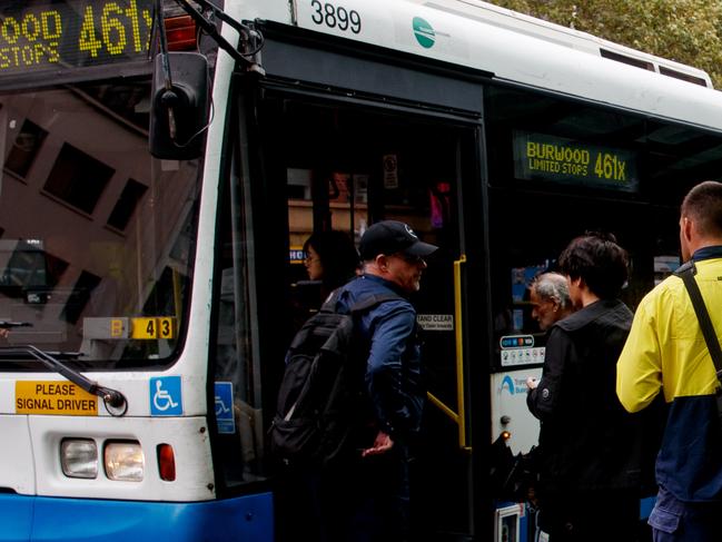 SYDNEY, AUSTRALIA - NewsWire Photos JANUARY 16, 2025: People wait for buses near Central Station on Thursday. Train services have again been cancelled and delayed amid industrial action from the Electrical Trades Union and the Rail, Tram and Bus Union. Picture: NewsWire / Nikki Short