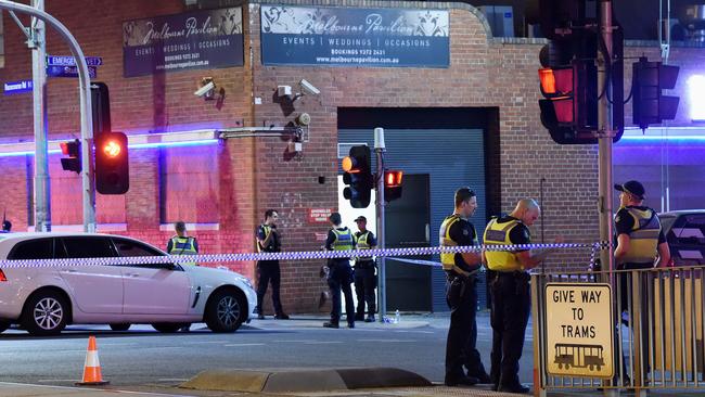 Police at the crime scene outside Melbourne Pavilion. Picture: Lawrence Pinder