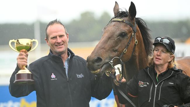 Paul Preusker with Captain Envious and the Ballarat Cup trophy. Picture: Vince Caligiuri/Getty Images