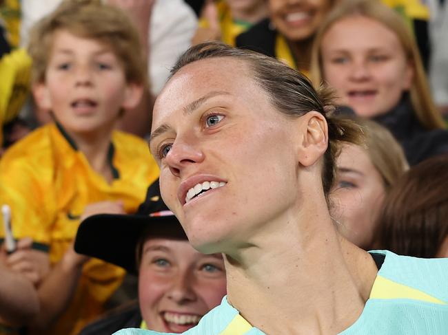BRISBANE, AUSTRALIA - AUGUST 19: Emily Van-Egmond of Australia takes a selfie with fans after the FIFA Women's World Cup Australia & New Zealand 2023 Third Place Match match between Sweden and Australia at Brisbane Stadium on August 19, 2023 in Brisbane, Australia. (Photo by Cameron Spencer/Getty Images)
