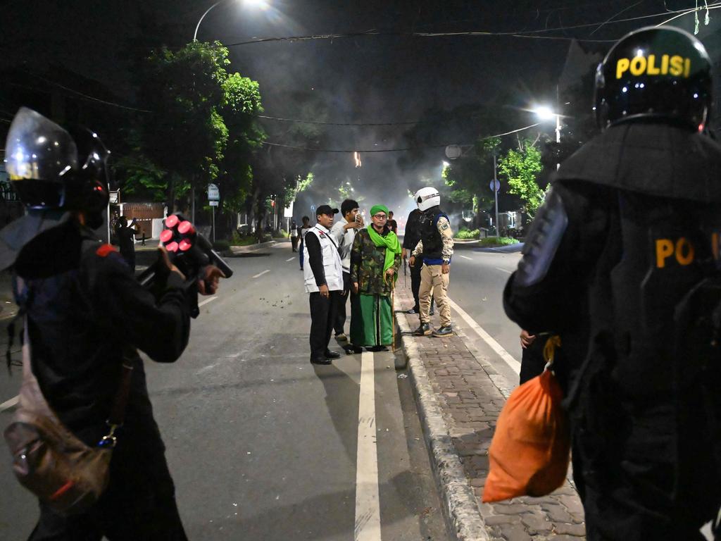 Indonesia Elections: Police Fire Tear Gas To Disperse Protesters | News ...