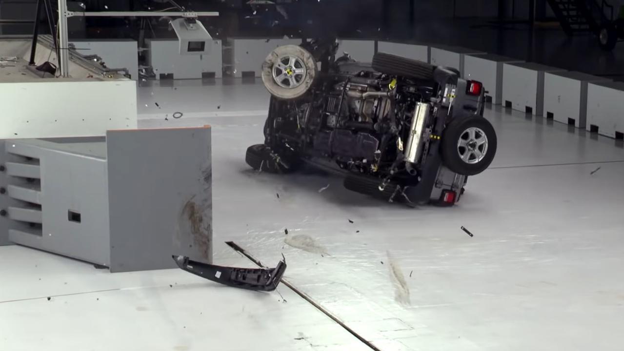 Jeep’s Wrangler flipped onto its side and skidded into safety barriers following a crash test.