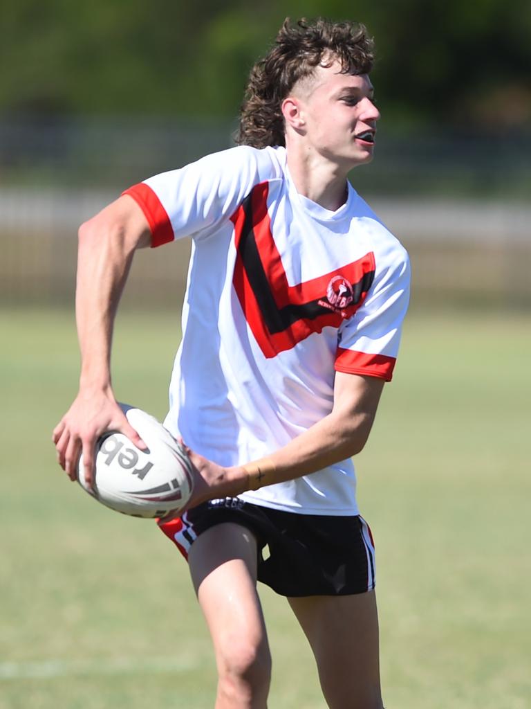 Boys Rugby League State Championship held at Northern Division, Brothers Leagues ground, Townsville. South West (black) v Wide Bay (white). 16-18 years. Brayden Bainbridge of Gympie SHS.