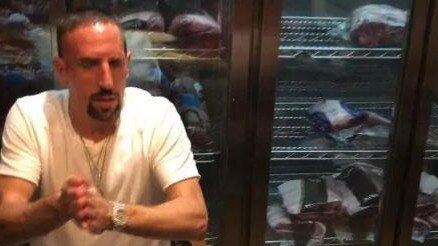 French football star Franck Ribery about to tuck into his $1780 gold-coated steak.