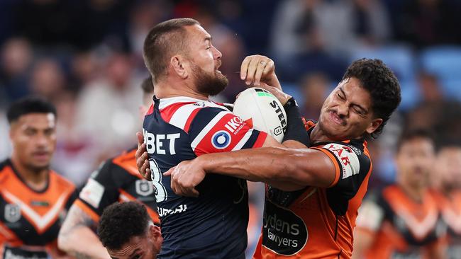 SYDNEY, AUSTRALIA - AUGUST 26:  Jared Waerea-Hargreaves of the Roosters is tackled during the round 26 NRL match between Sydney Roosters and Wests Tigers at Allianz Stadium on August 26, 2023 in Sydney, Australia. (Photo by Matt King/Getty Images)