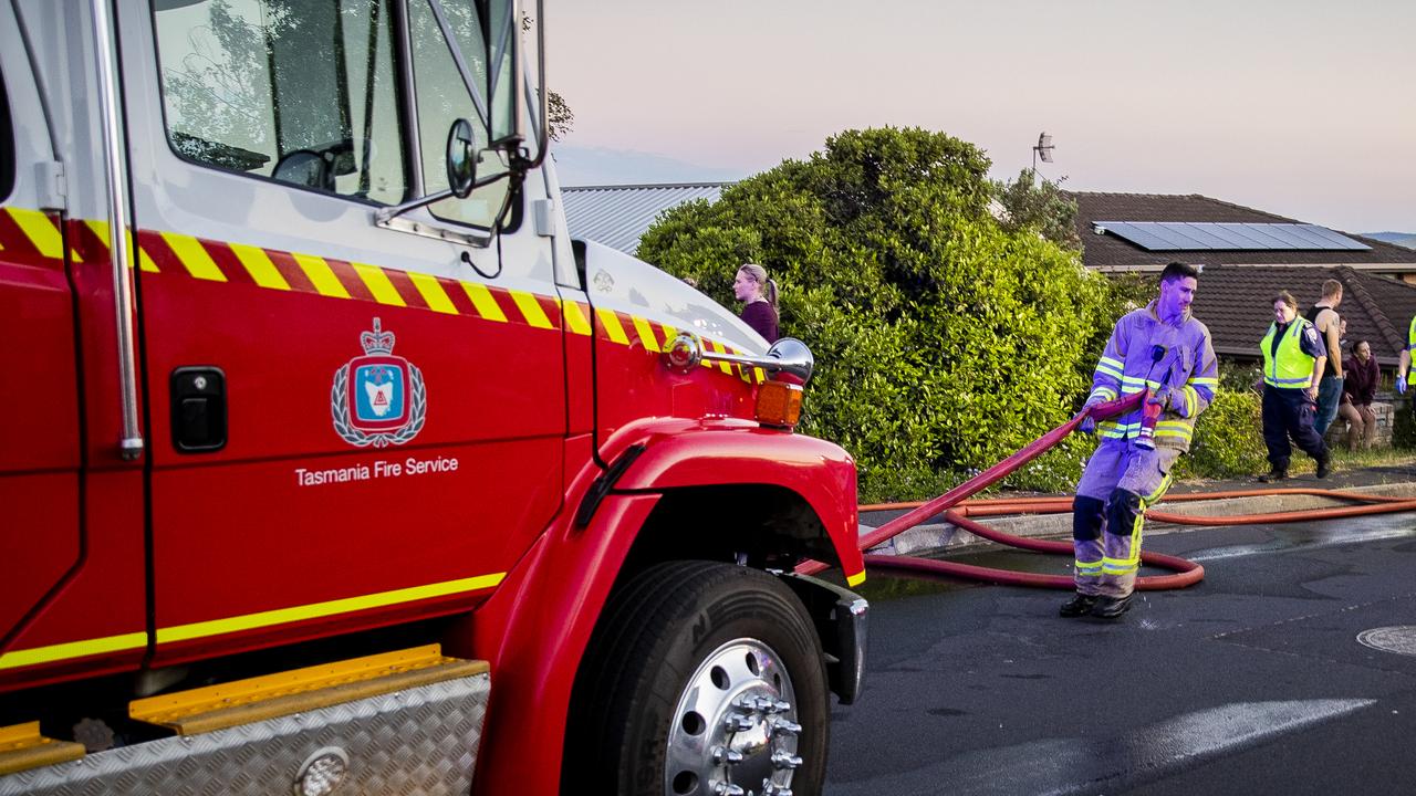 Tasmania Police and Tasmania Fire Service attend a house fire. Richard Jupe