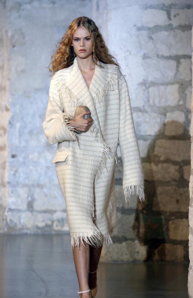 A cosy Christopher Esber wrap dress at PFW. Picture: Thierry Chesnot/Getty Images