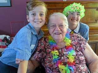 Eli Butcher and Maddy Howell chat with their buddy Doris. Picture: Contributed