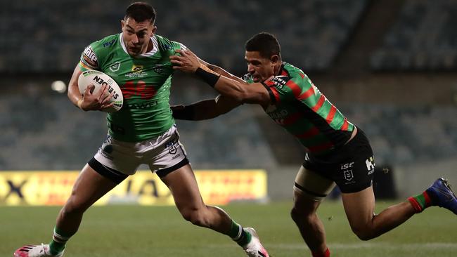 CANBERRA, AUSTRALIA - JULY 25: Nick Cotric of the Raiders breaks away from a tackle during the round 11 NRL match between the Canberra Raiders and the South Sydney Rabbitohs at GIO Stadium on July 25, 2020 in Canberra, Australia. (Photo by Mark Metcalfe/Getty Images)