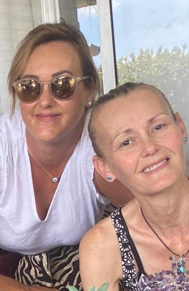 Bli Bli single mum-of-two Angie Evans, front, with her sister Leila Evans, has defied her doctors’ terminal cancer diagnosis and is hoping for one more Christmas with her children.