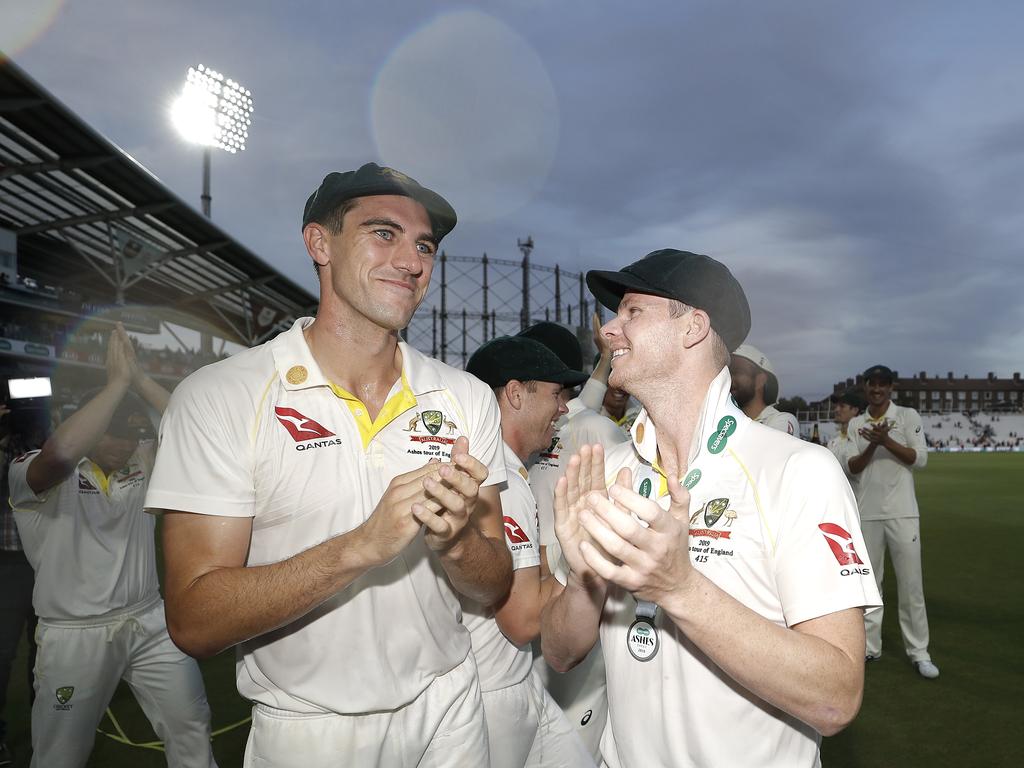 Pat Cummins of Australia and Steve Smith celebrate after the 2019 drawn Ashes series. Smith previously captained Australia before resigning in 2018. Picture: Ryan Pierse/Getty Images