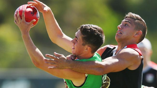 Ball magnet — Jade Gresham marks against Darren Minchington during a Saints training session. Picture: Michael Dodge (Getty Images)