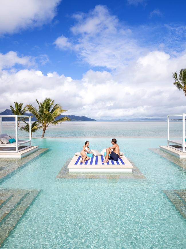 A pool with a water view.