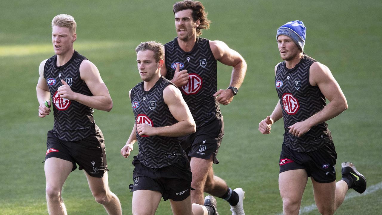 Jackson Mead, leading the Power running group at training, will also return to footy in the SANFL this weekend. Picture: Mark Brake.