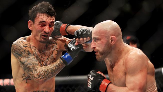 Max Holloway (left) is fighting Ilia Topuria for the featherweight belt. (Photo by Carmen Mandato/Getty Images)