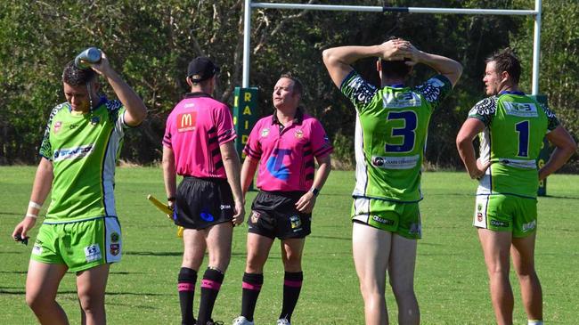 TOUGH JOB: NRRRL referee Josh Gollan consults one of his sideline officials in a game this season. Picture: Mitchell Craig