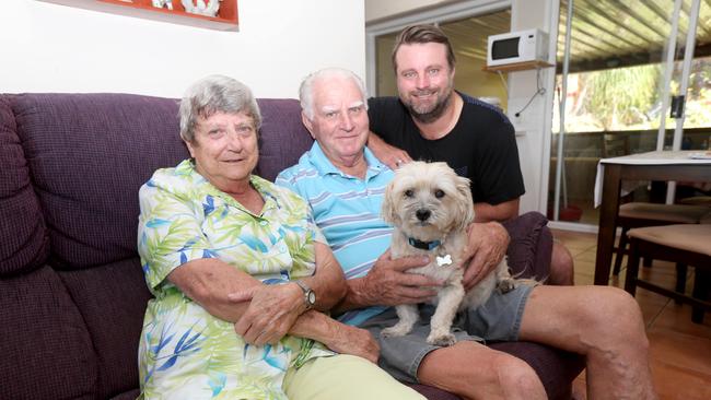 Pictured at their Oxenford home cricketer Sean Fitzsimmons with father Ross, mother Carol and dog Floyd who are all off to the national Country Cricket Championships in Geraldton. Picture MIKE BATTERHAM