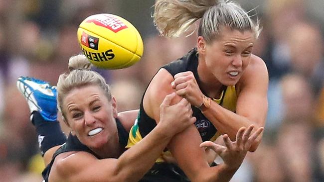 Katie Brennan is hit with a crunching tackle by Katie Loynes during a poor Round 1 performance. Picture: Getty Images