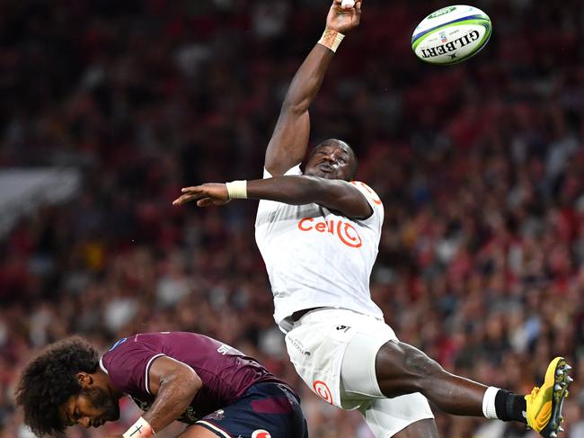 Madosh Tambwe (right) soars over Henry Speight. Picture: AAP/Darren England