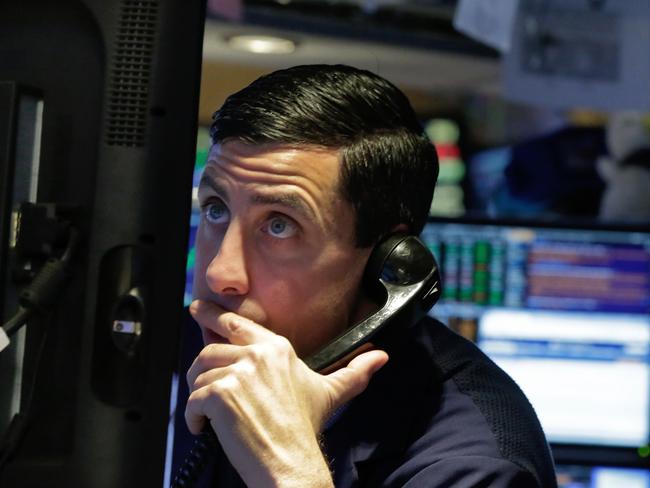 A trader studies his screen as he works on the floor of the New York Stock Exchange, Wednesday, March 30, 2016. U.S. stocks are rising Wednesday as banks and technology stocks trade higher. (AP Photo/Richard Drew)