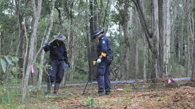 Gympie Police and SES crews conducting a search at the Goomboorian property where Bruce Saunders died in a woodchipper last year.