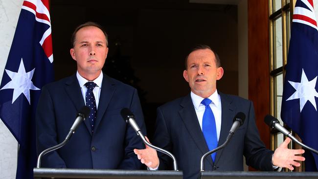 Dutton as health minister in 2014 with then prime minister Tony Abbott.