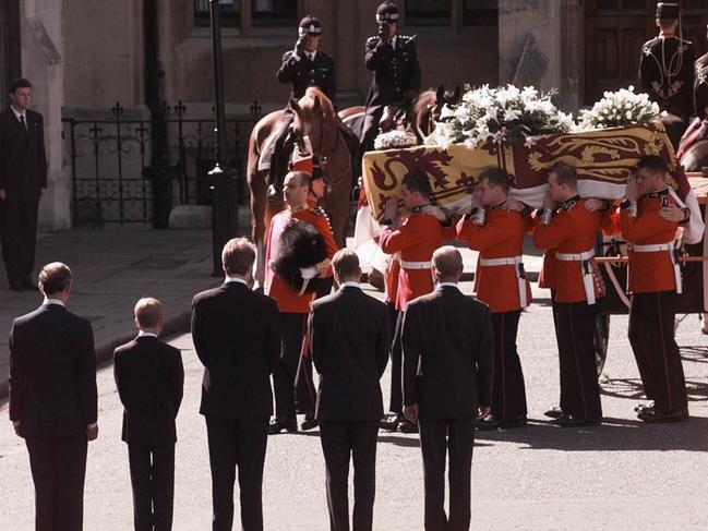 Earl Spencer, Prince William, Prince Harry, Prince Charles and Prince Philip wait as the coffin of Diana, Princess of Wales, is carried by Welsh guardsmen into Westminster Abbey, London, for her funeral service in 1997.