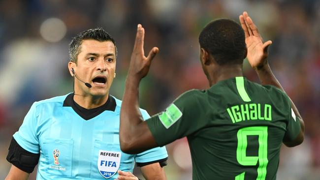 Odion Jude Ighalo vents his frustration at the referee.