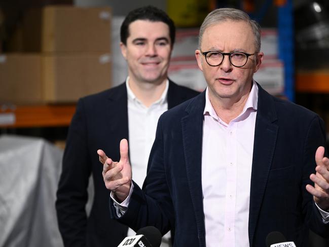 Assistant Minister for Foreign Affairs Tim Watts (left) and Australian Prime Minister Anthony Albanese speak to media during a visit to Sweet Magic in Truganina, Melbourne, Sunday, June 30, 2024. (AAP Image/Joel Carrett) NO ARCHIVING