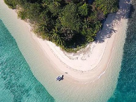 Timana Island is up for sale for $15m - it is located between Dunk Island and Bedarra Island, in the Coral Sea adjacent to the Great Barrier Reef. Picture: Mission Beach Real Estate