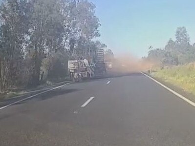 Watch: Drivers ‘shocked’ as trailer crashes across median strip