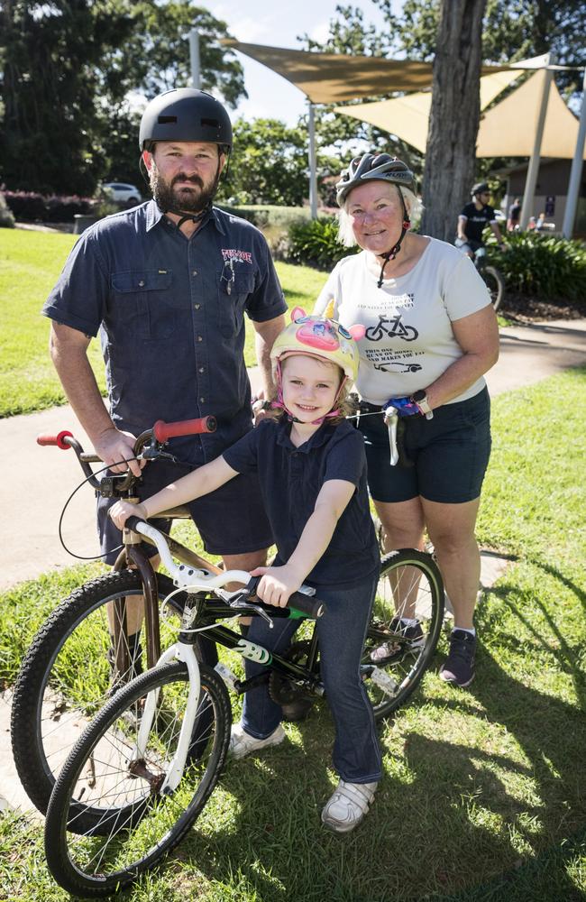 Isabelle Pascoe with dad Trent Pascoe and grandmother Judi Pasoce are ready at Queens Park to join the Community Bike Ride. Picture: Kevin Farmer