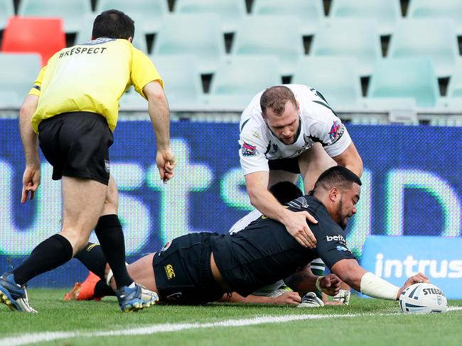 St Marys takes on Mounties in the final of the Ron Massey Cup at Parramatta stadium. Mounties Allen Mulia Malau reaches for the tryline