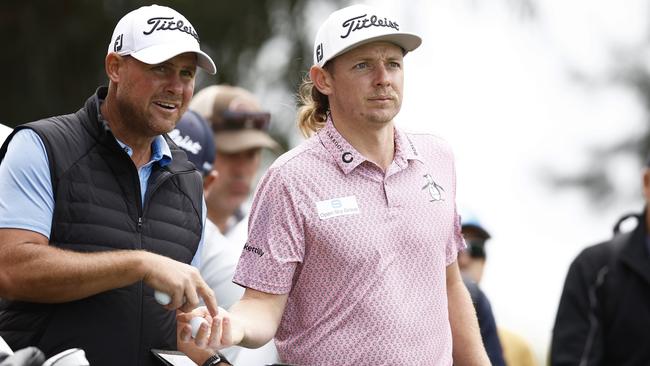 Cameron Smith with his caddie Sam Pinfold at Kingston Heath Golf Club on Tuesday ahead of the Australian Open Picture: Getty Images