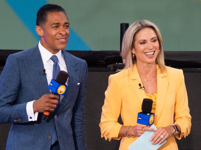 NEW YORK, NEW YORK - JULY 08: (L-R) T.J. Holmes and Amy Robach attend ABC's "Good Morning America" at SummerStage at Rumsey Playfield, Central Park on July 08, 2022 in New York City. (Photo by Noam Galai/Getty Images)