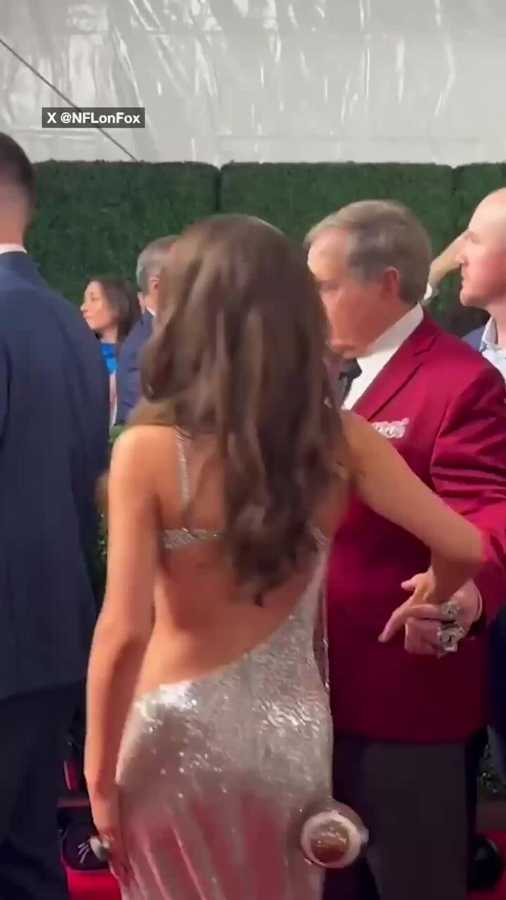 NFL icon, 72, on red carpet with 24yo girlfriend