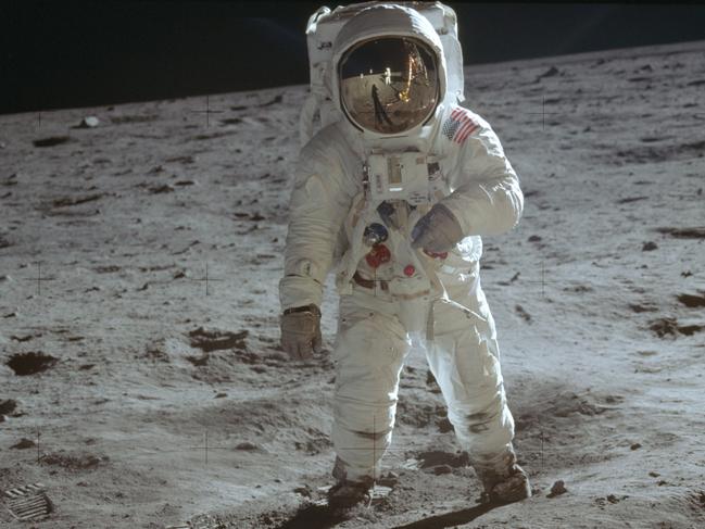 ADVANCE FOR USE SATURDAY, JULY 13, 2019 AND THEREAFTER-In this July 20, 1969 photo made available by NASA, astronaut Buzz Aldrin, lunar module pilot, walks on the surface of the moon during the Apollo 11 extravehicular activity. (Neil Armstrong/NASA via AP)