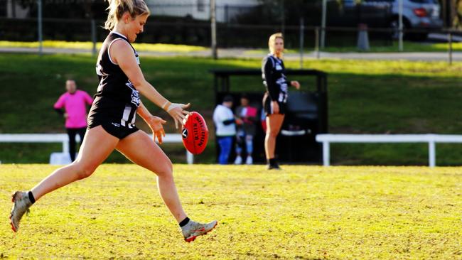 Hannah Slaughter gets a kick away in her last game Picture: Alistair Knox