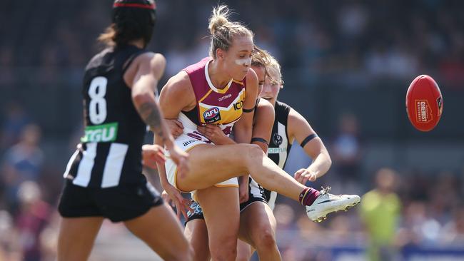 Brisbane’s Lauren Arnell kicks under pressure. Picture: Getty Images