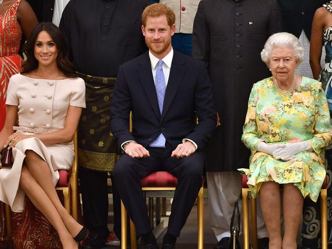 Meghan and Harry remain close to Queen Elizabeth, far right. Picture: AFP