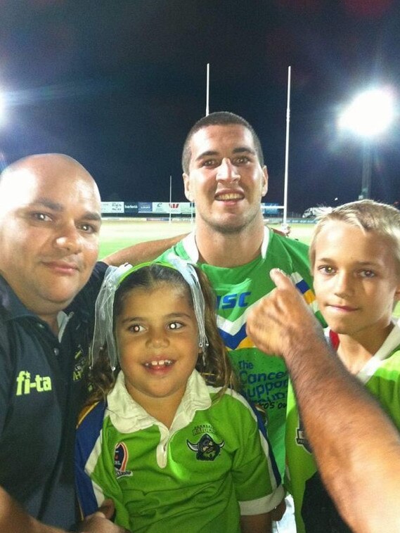 Joel Thompson in 2013 while playing for the Raiders with his late cousin Daniel Charles (left).