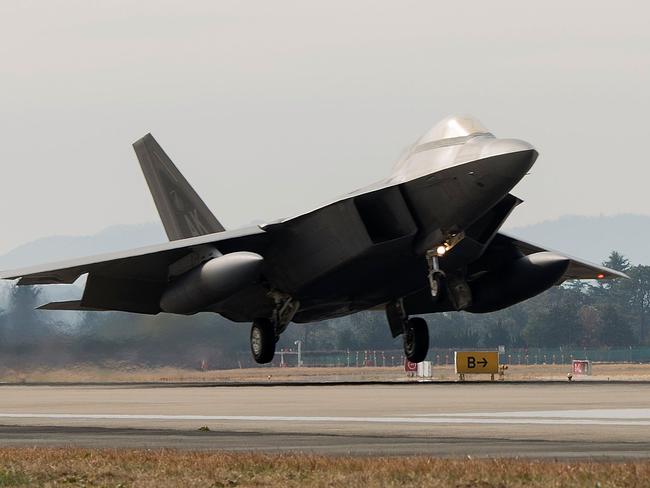 A US Air Force jet touches down in South Korea. Donald Trump wants to halt US military drills in the region. Picture: Getty Images