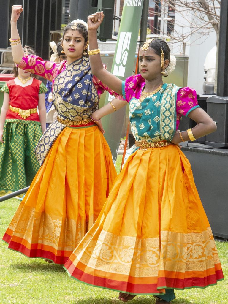 Thaarani Sivanathan (left) and Aishwitha Kandasamy from Hrdayam School of Dance at Peace Day Toowoomba in Laurel Bank park. Saturday, October 1, 2022. Picture: Nev Madsen.