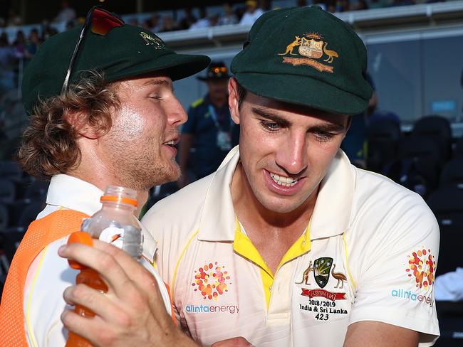 Pucovski with Pat Cummins after the Aussies’ first test win over Sri Lanka last summer. Pic: Getty Images