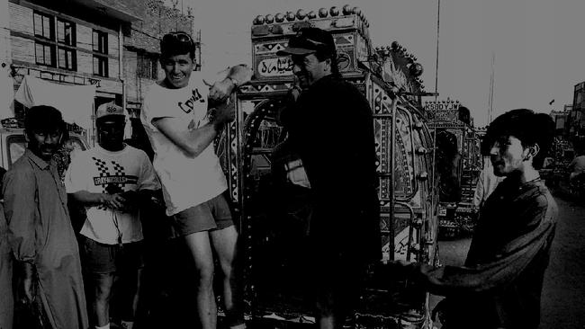 Gavin Robertson and Steve Waugh take ride on back of taxi in Rawalpindi in 1994.