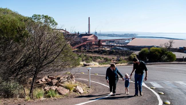 Alicia, Charlotte and Tom Wilson overlooking the steelworks in Whyalla in South Australia. Picture: Morgan Sette