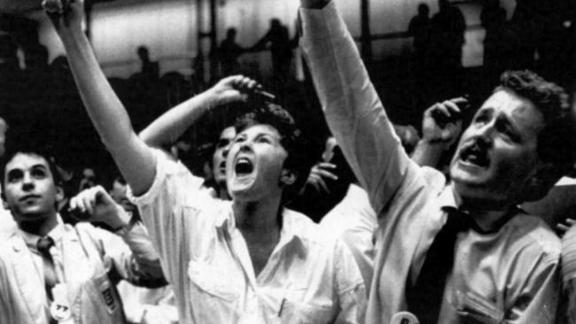 Dealers on the trading floor of the Sydney Stock Exchange yelling as they try to sell shares at the close of trading during the 1987 stockmarket crash./Stock/exchanges